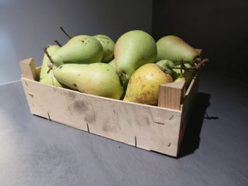 High angle view of pears in crate