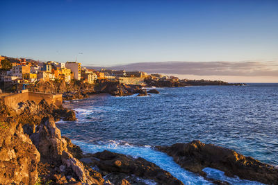 Scenic view of sea against sky during sunset