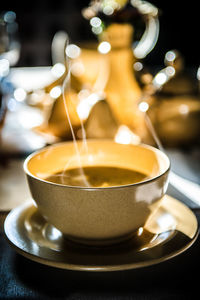 Close-up of coffee cup on table