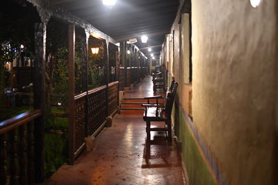 Empty corridor along buildings