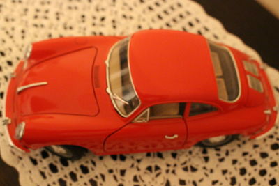 High angle view of red car on table