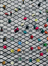 Close-up of multi colored chainlink fence