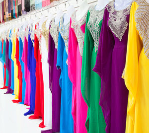 Multi colored umbrellas hanging at market stall