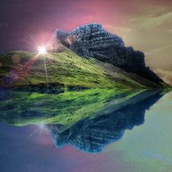 Digital composite image of mountain against sky