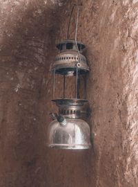 Close-up of illuminated lantern hanging on wall