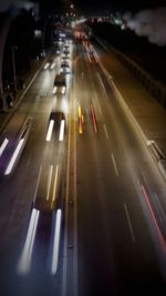 Traffic light trails on road at night