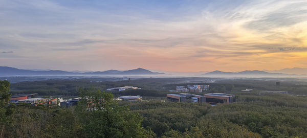 High angle view of townscape against sky during sunset