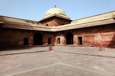 Exterior of jodha bai palace on sunny day