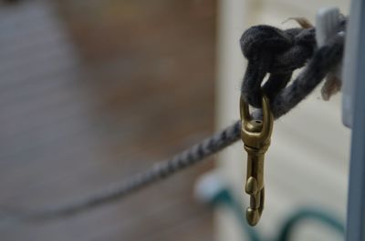 Close-up of rope hanging on door