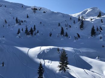 Scenic view of snowcapped mountains against sky