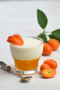 Close-up of orange juice on table