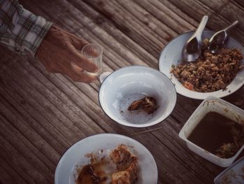 High angle view of person preparing food on table