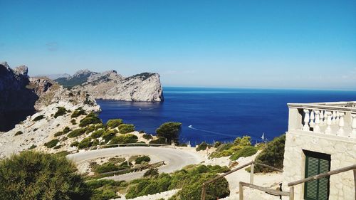 Scenic view of sea against clear blue sky