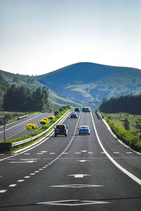 A flat broad asphalt road