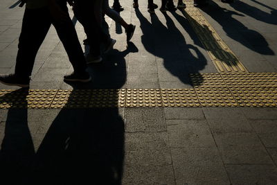 Shadow of a walking person.