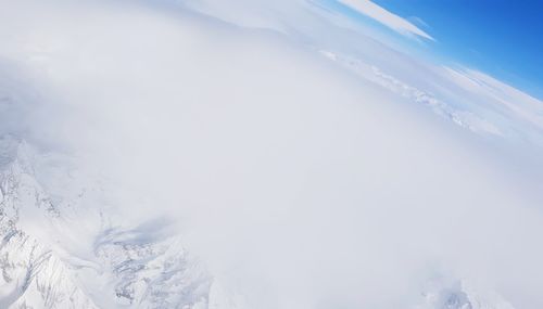 Snow covered mountain against sky