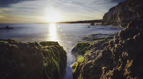 Panoramic view of sea against sky during sunset