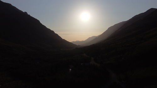 Scenic view of mountains against sky during sunset