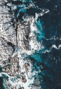 Aerial view of rock and sea