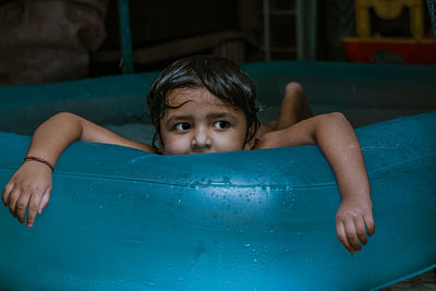 Portrait of boy in swimming pool