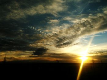 Scenic view of dramatic sky during sunset