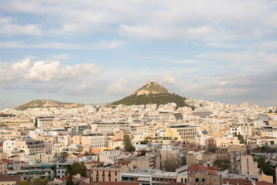 Aerial view of townscape against sky