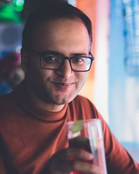 Close-up portrait of smiling young man