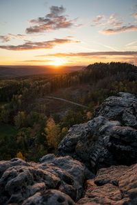 Scenic view of landscape against sky during sunset