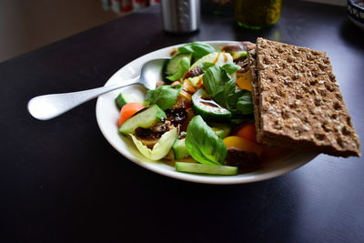 High angle view of breakfast served on table