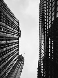 Low angle view of skyscrapers against sky