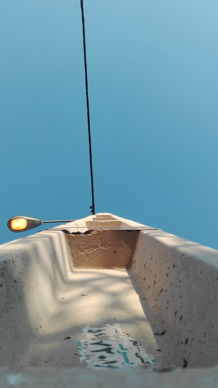 clear sky, cable, blue, day, outdoors, no people, man made object, footpath, the way forward