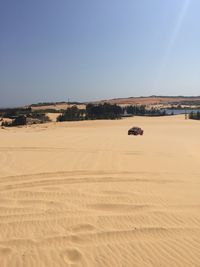 Scenic view of desert against clear sky