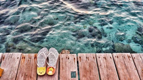 High angle view of chocolate on swimming pool in sea