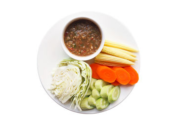 High angle view of salad in bowl against white background