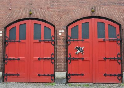 Red closed door of building
