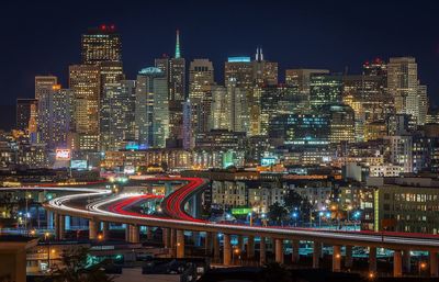 Illuminated cityscape at night