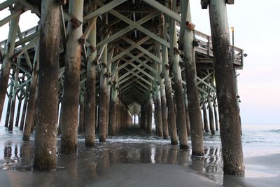 Pier over sea against sky