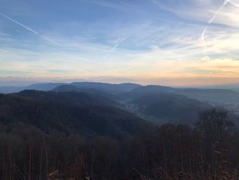 Scenic view of mountains against sky during sunset