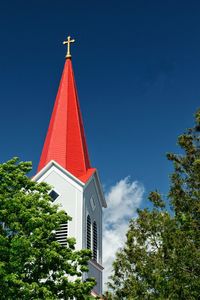Low angle view of temple against clear blue sky