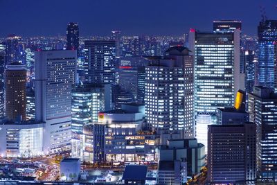 Illuminated cityscape at night