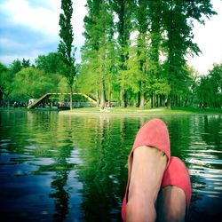 Low section of woman in water