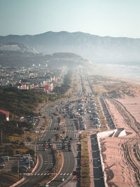 High angle view of city street against sky