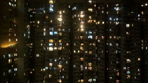 Full frame shot of illuminated building at night