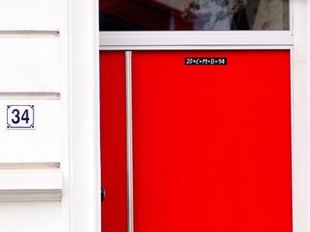 Text on red door