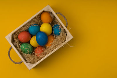 High angle view of multi colored candies in box