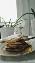 Close-up of cake on table at home