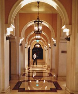 Illuminated corridor of building