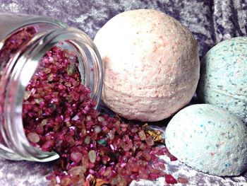 High angle view of berries in jar on table