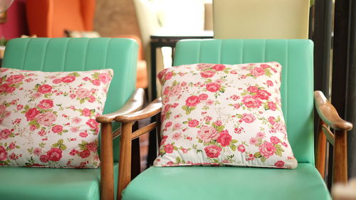 Close-up of cushions on chair
