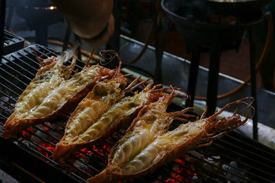 Close-up of meat on barbecue grill